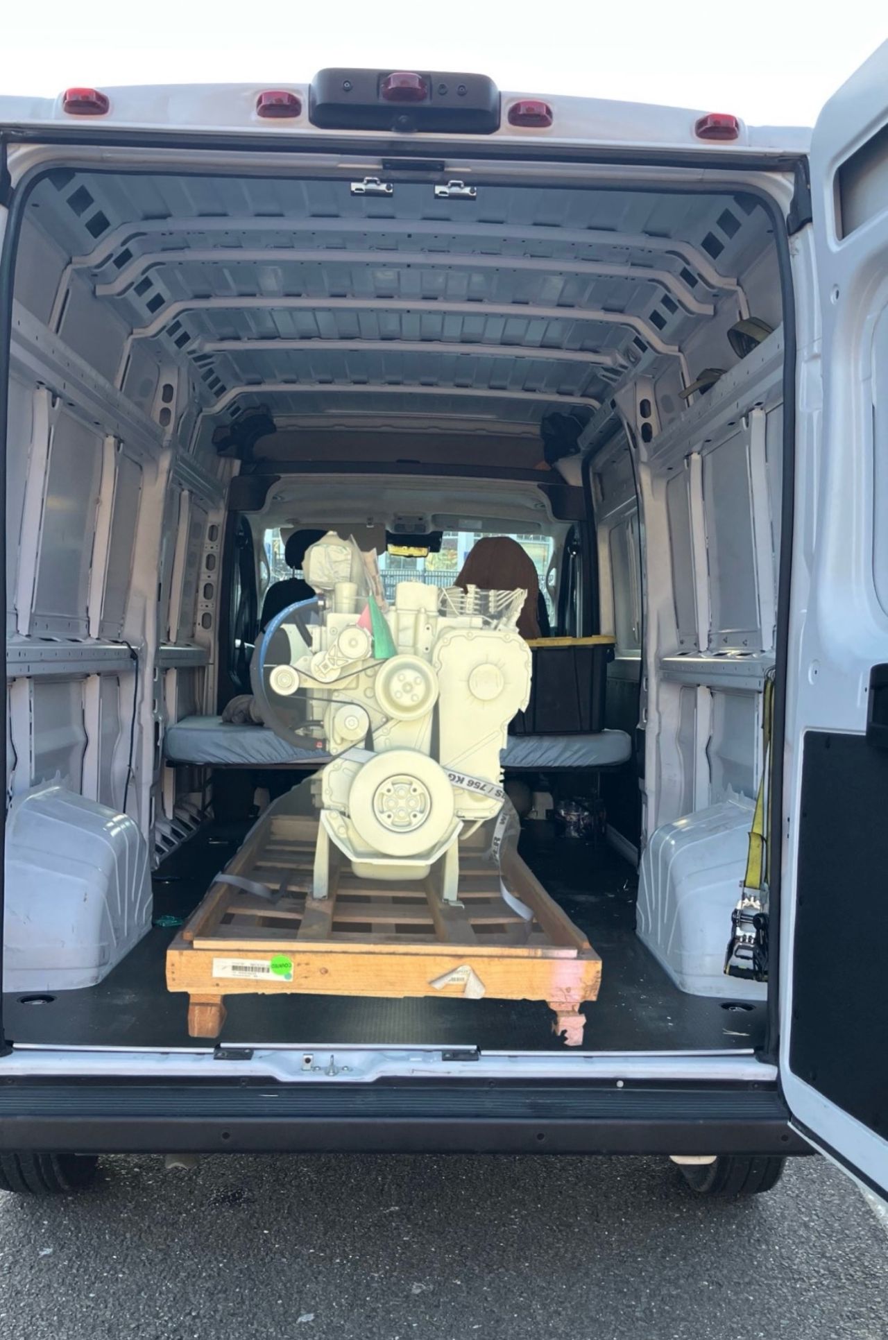 An engine, palletized and secured, ready for VONEX-arranged delivery