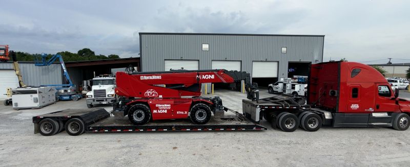 Specialized heavy equipment secured on a lowboy for a VONEX-arranged move